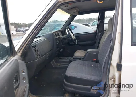 1999 Jeep Cherokee Rhd Rural Letter Carrier z USA, uszkodzony, nr VIN 1J4FB28S6XL610302